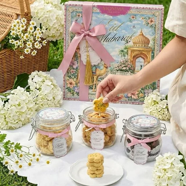 A hamper of Momma Jakarta cookie jars laid out on a picnic cloth